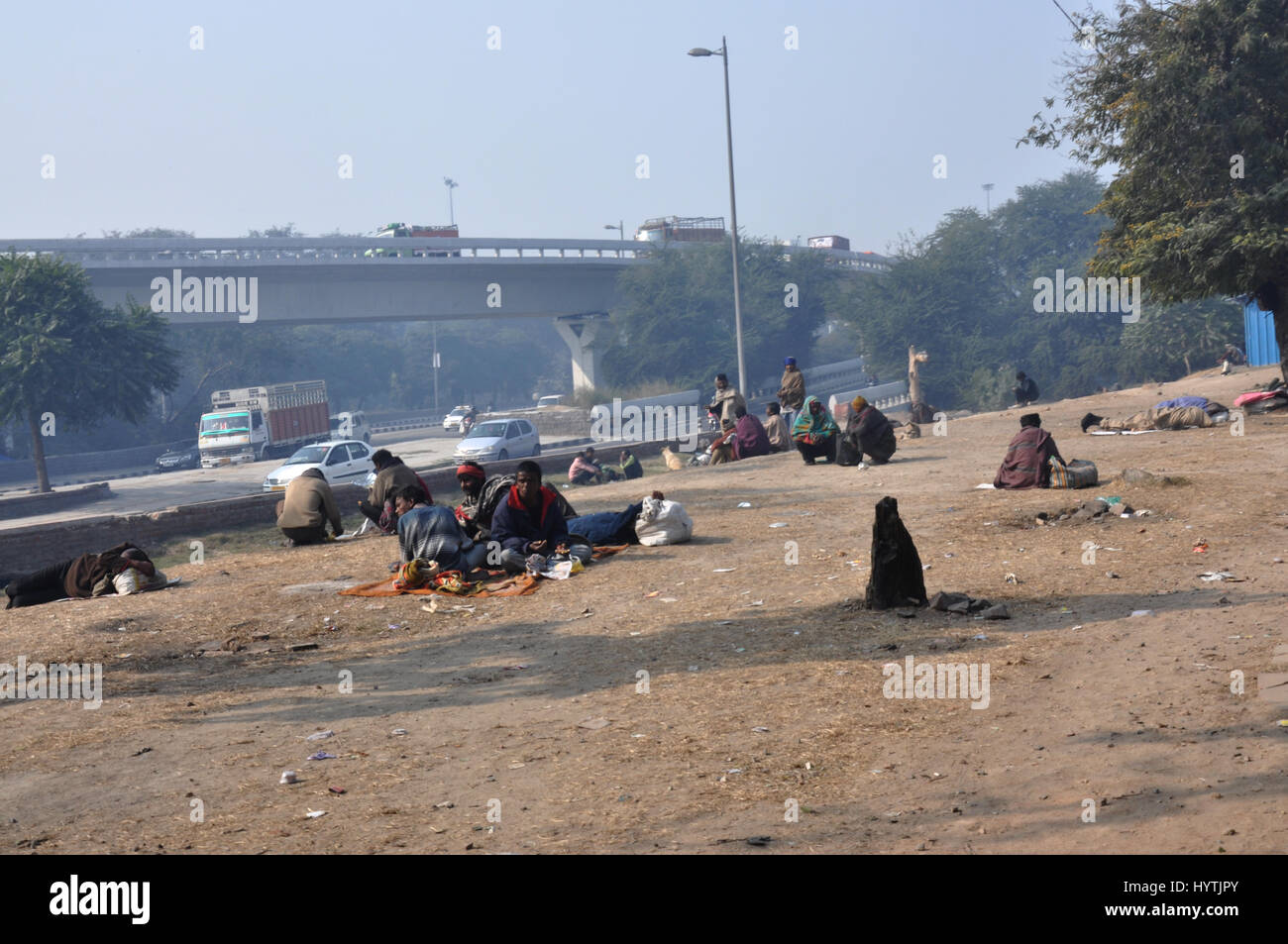Street | Delhi, India, Feeding The Poor - Embracing The World, Wait for food, (Photo Copyright © by Saji Maramon) Stock Photo
