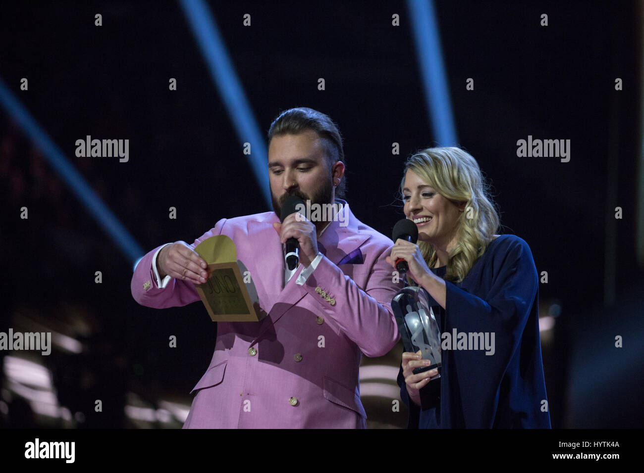 Musician Coleman Hell and Heritage Minister Mélanie Joly present Breakthrough Artist award at the 2017 Juno Awards. Stock Photo