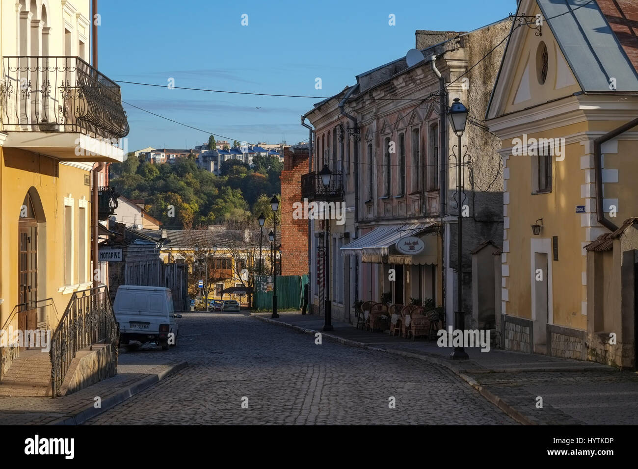 Narrow cobbled street in the old city of Kamianets-Podilski Ukraine. The city is famed for it's castle and canyon surrounding the old town Stock Photo