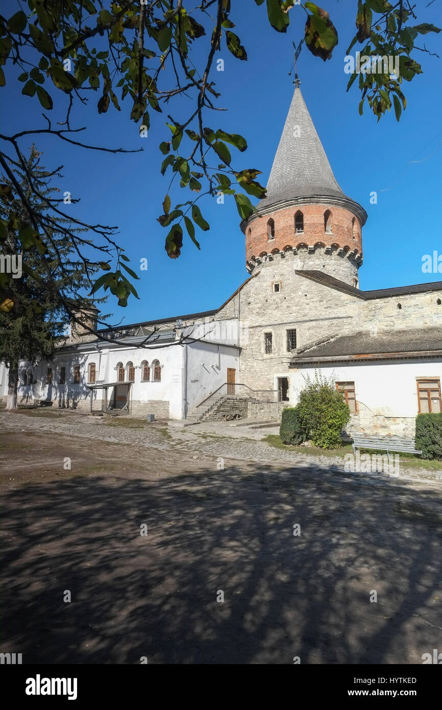 Inner courtyard and tower of Kamianets-Podilskyi castle in Western Ukraine. Shot on a beautiful clear autumn day with blue skies. Stock Photo