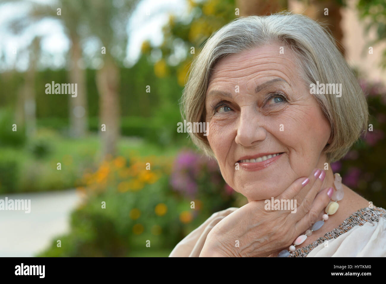 Portrait of a beautiful happy elderly woman Stock Photo - Alamy