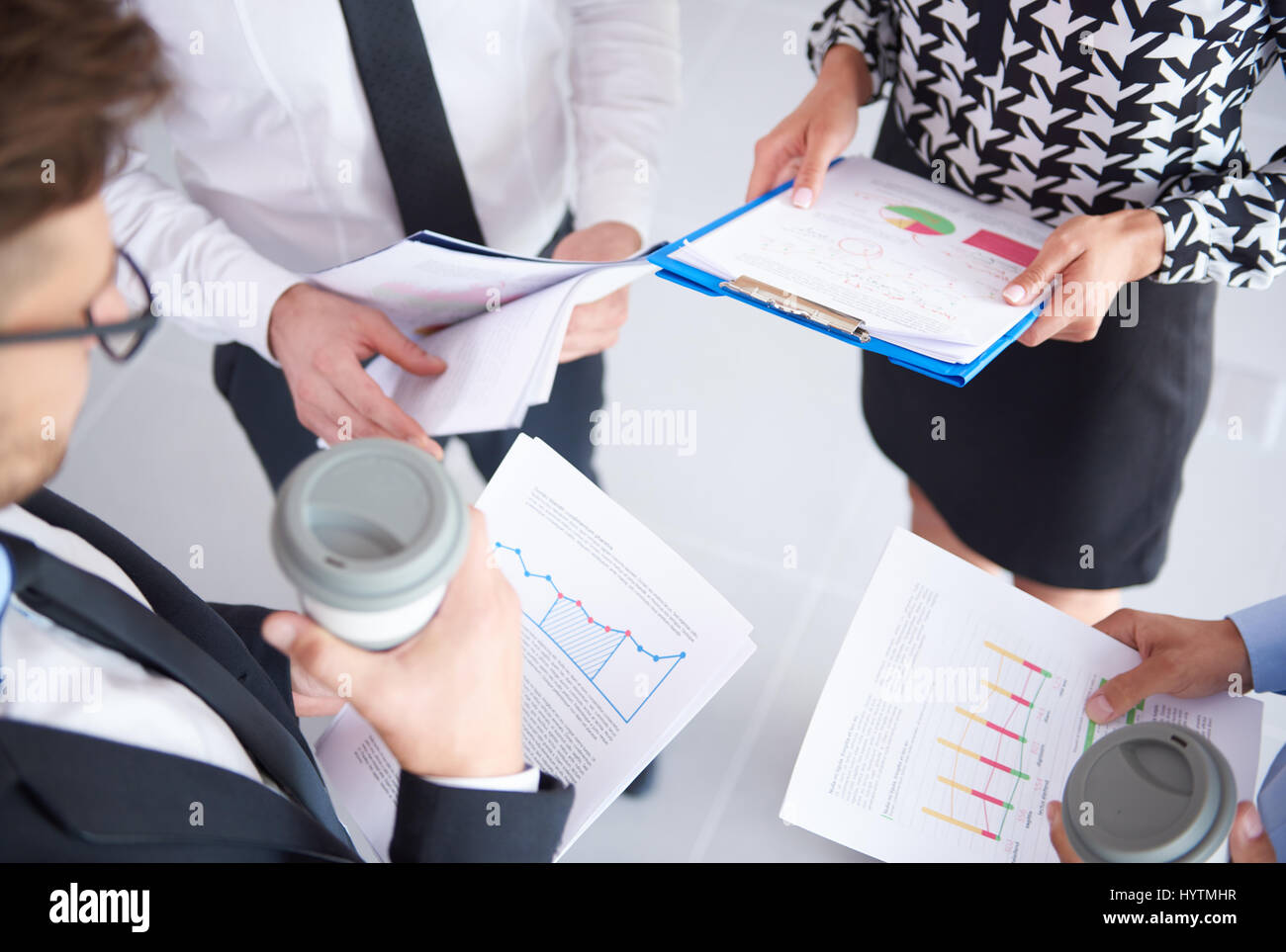 Important documents analyzed by group of people Stock Photo