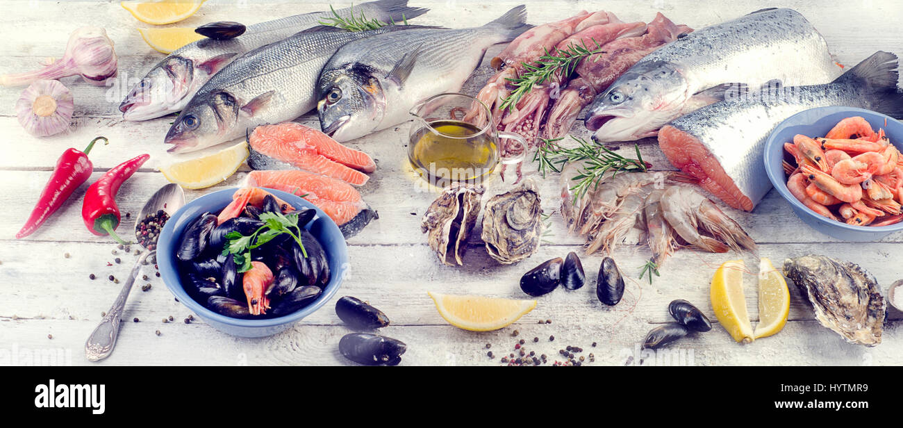 Fresh seafood with spices. Healthy diet food. Flat lay Stock Photo - Alamy