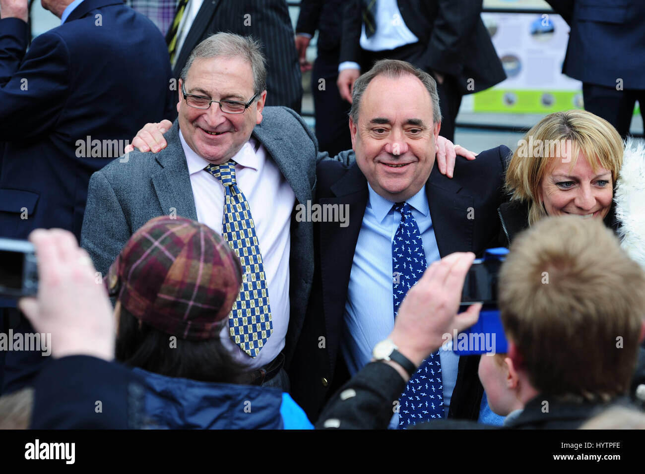 Former SNP leader ALex Salmond (C), now elected as an SNP MP, poses for photographs at an SNP event in South Queensferry Stock Photo
