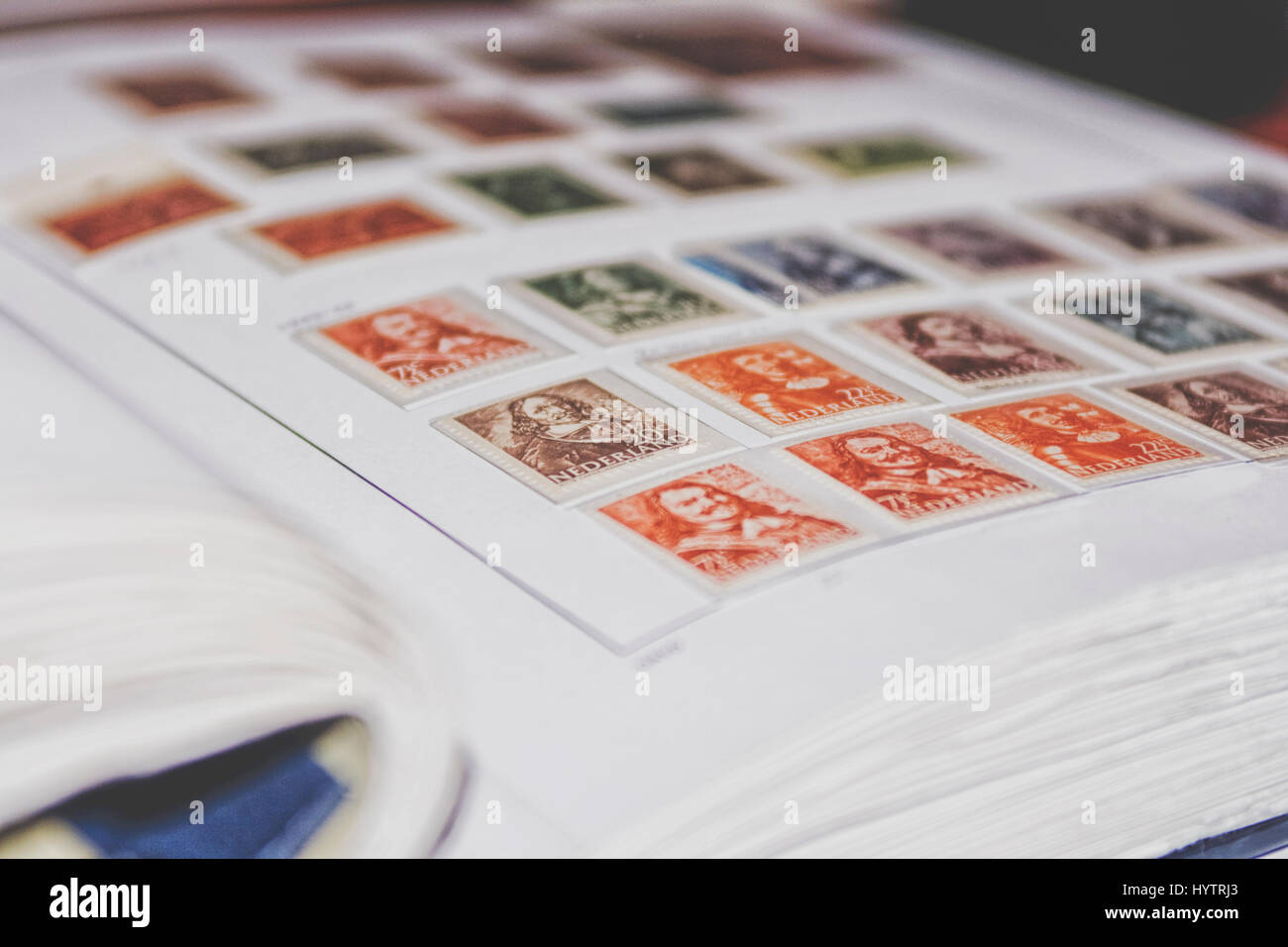 Album with Dutch vintage postage stamps Stock Photo