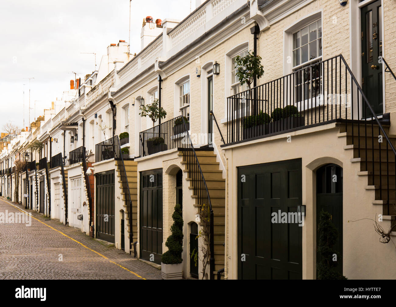 Houses in Holland Park Mews. Houses in mews are one of the most luxurious and desirable in London Stock Photo