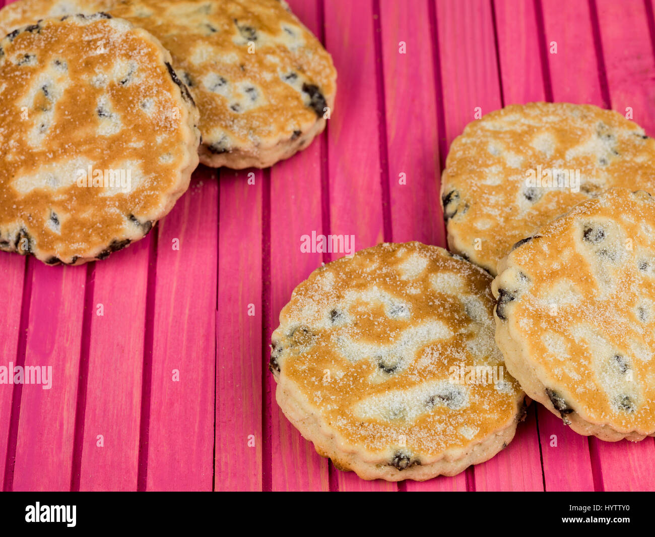 Baked Fruit Welsh Cakes Against a Pink Background Stock Photo