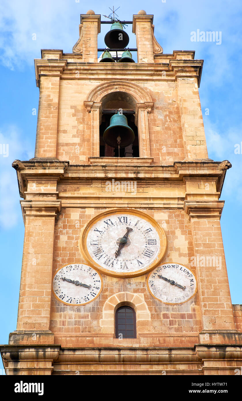 The bell and clock tower of St. John 's CoCathedral, showing the time