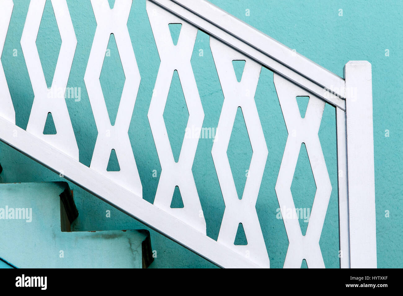 Detail of an outside staircase, white and cyan. Stock Photo