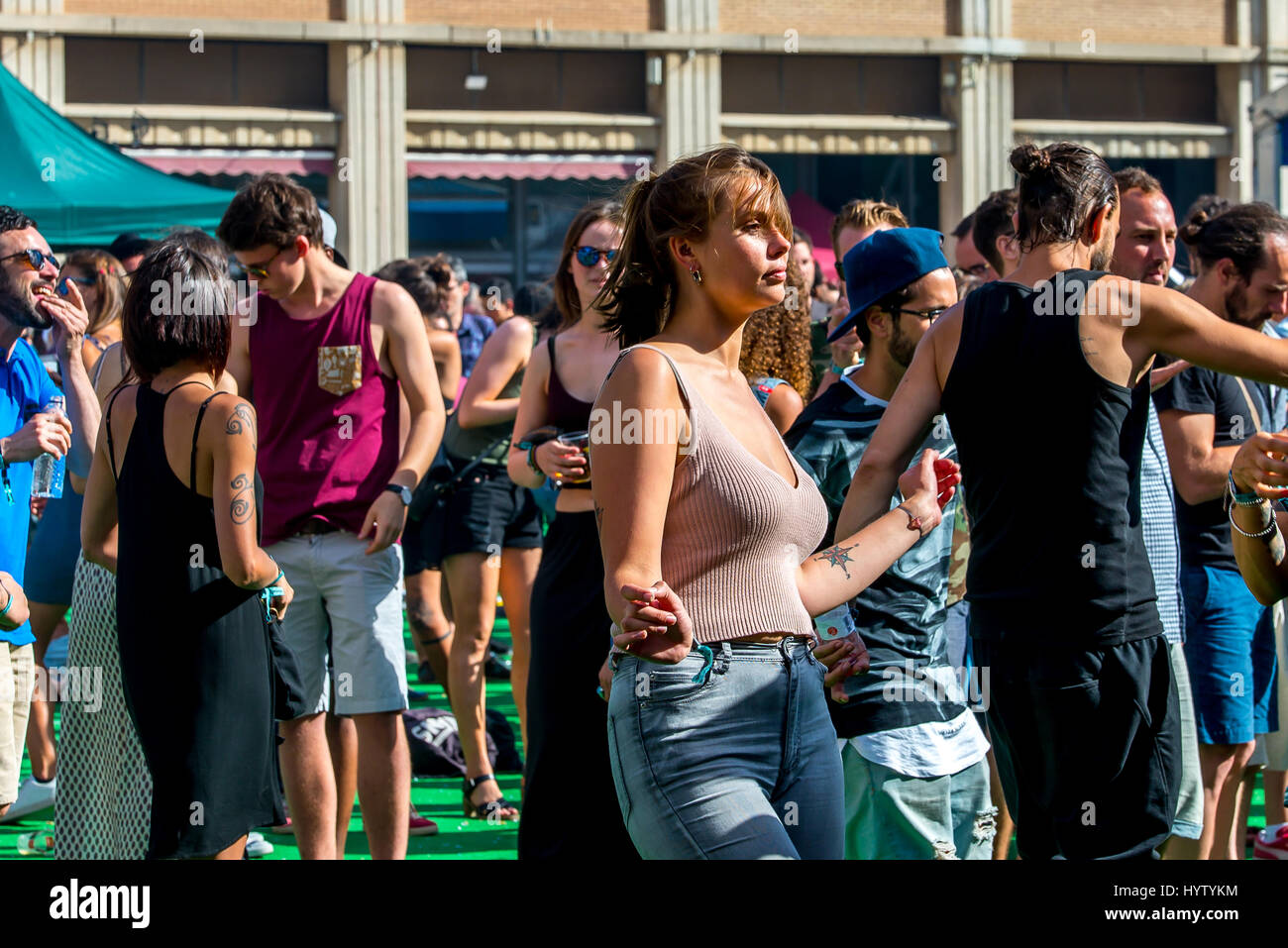 BARCELONA - JUN 16: People dance in a concert at Sonar Festival on June 16, 2016 in Barcelona, Spain. Stock Photo
