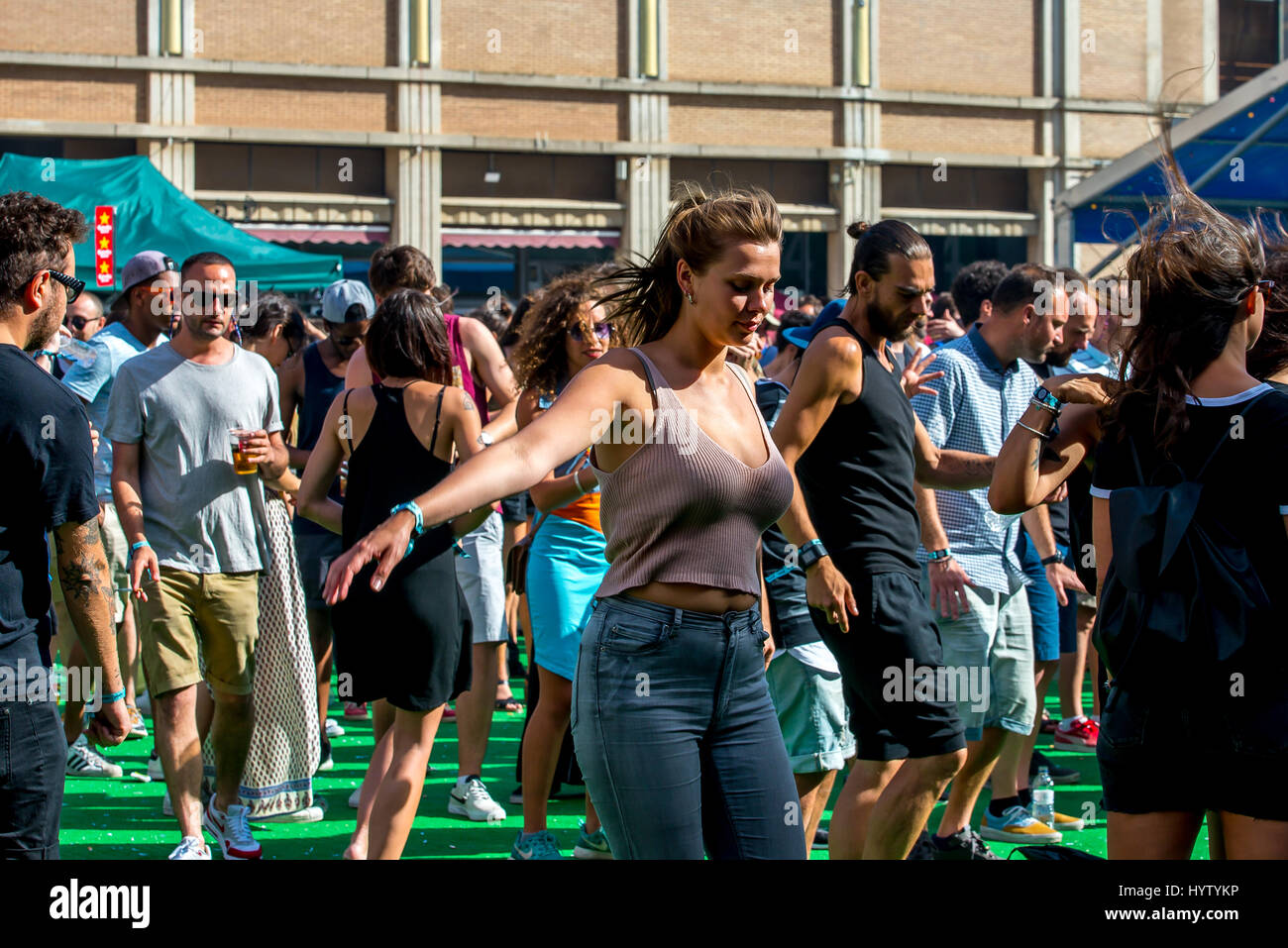 BARCELONA - JUN 16: People dance in a concert at Sonar Festival on June 16, 2016 in Barcelona, Spain. Stock Photo