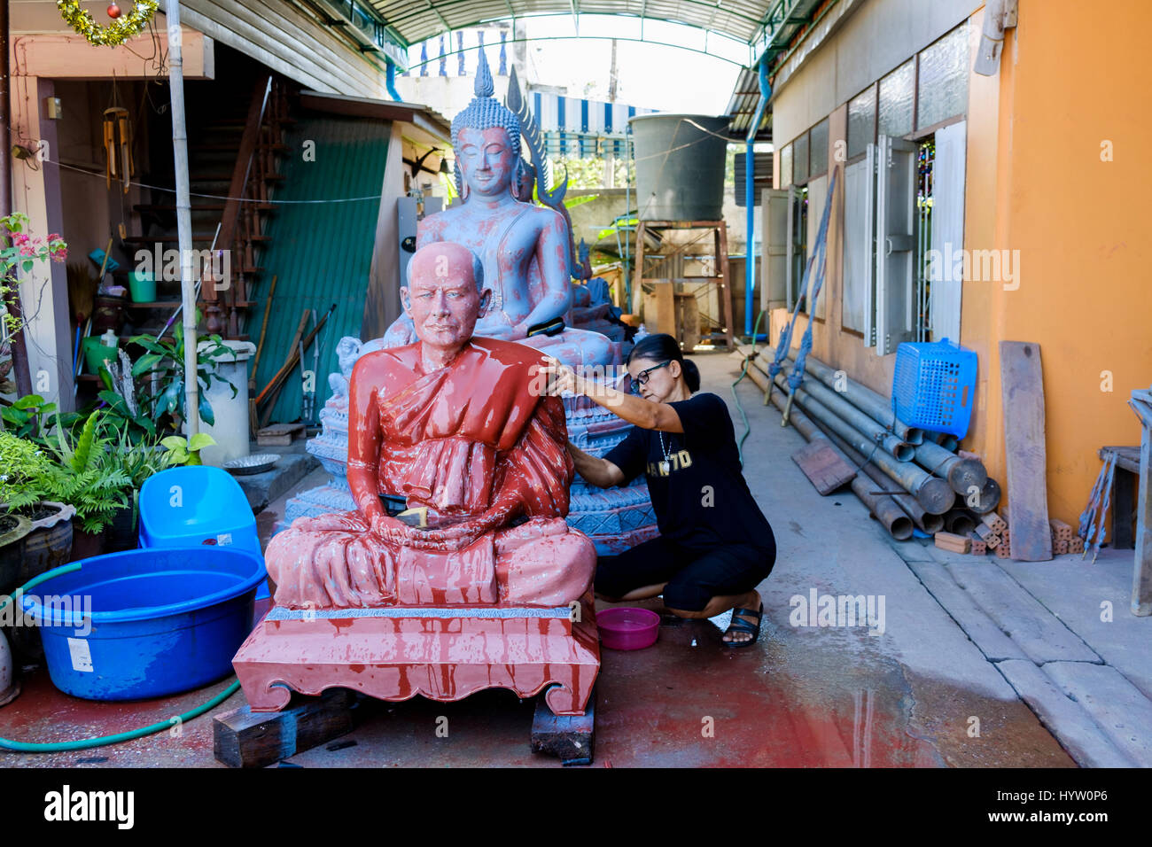 Half finished Buddha and holy man statues at the Buranathai Buddha Image Foundry, Phitsanulok, Thailand. Stock Photo