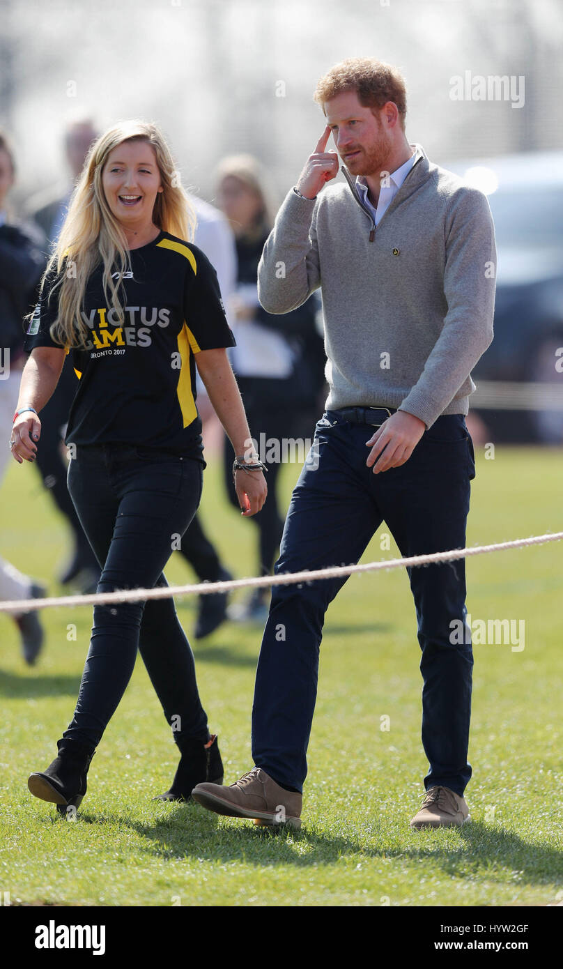 Prince Harry with Jayne Kavanagh, Invictus Games UK Team Chef de Mission, as he arrives to watch the UK team trials for the Invictus Games Toronto 2017 at the University of Bath Sports Training Village in Bath. Stock Photo