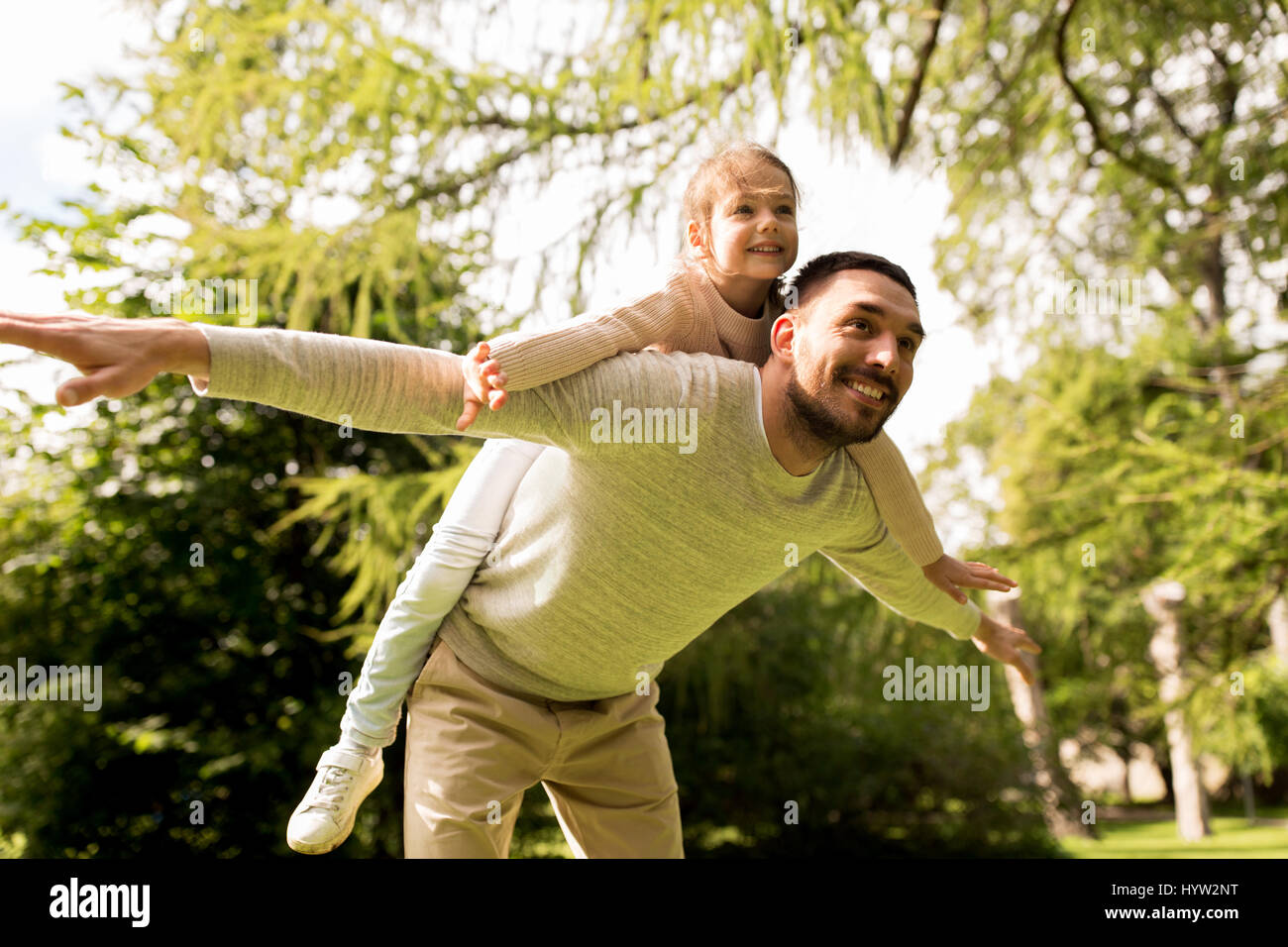 happy family having fun in summer park Stock Photo