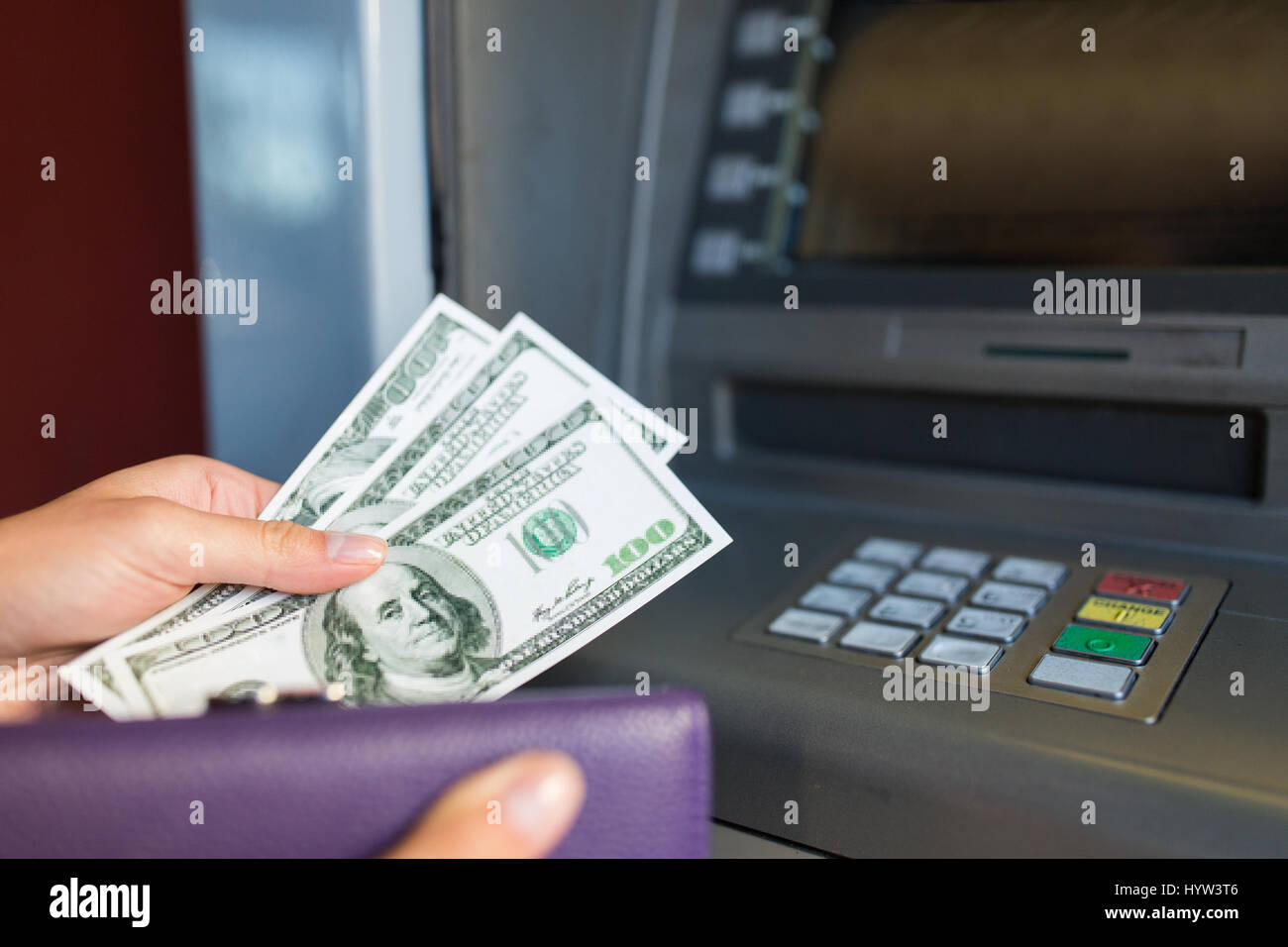 close up of hand withdrawing money at atm machine Stock Photo