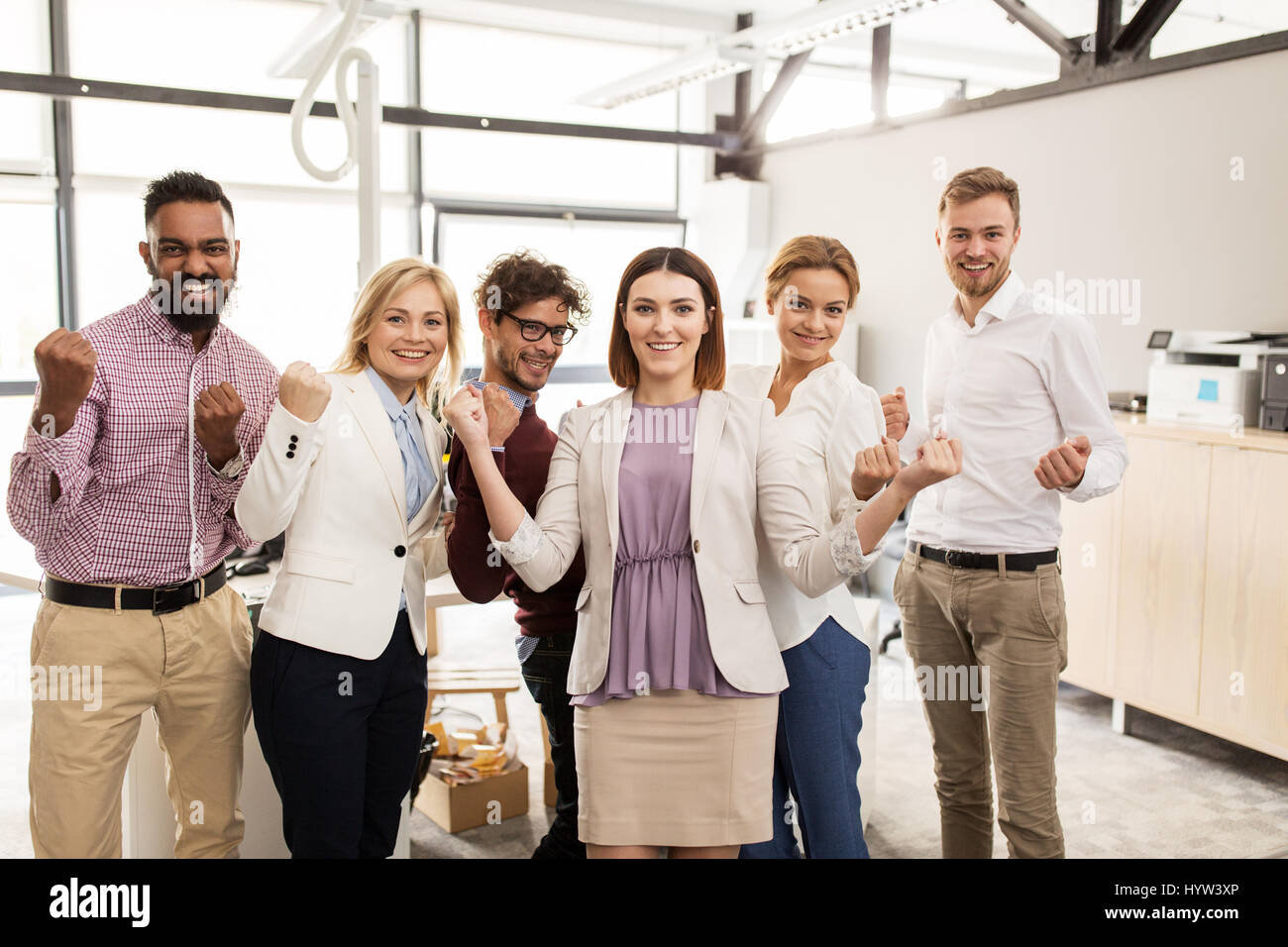 happy business team celebrating victory at office Stock Photo - Alamy