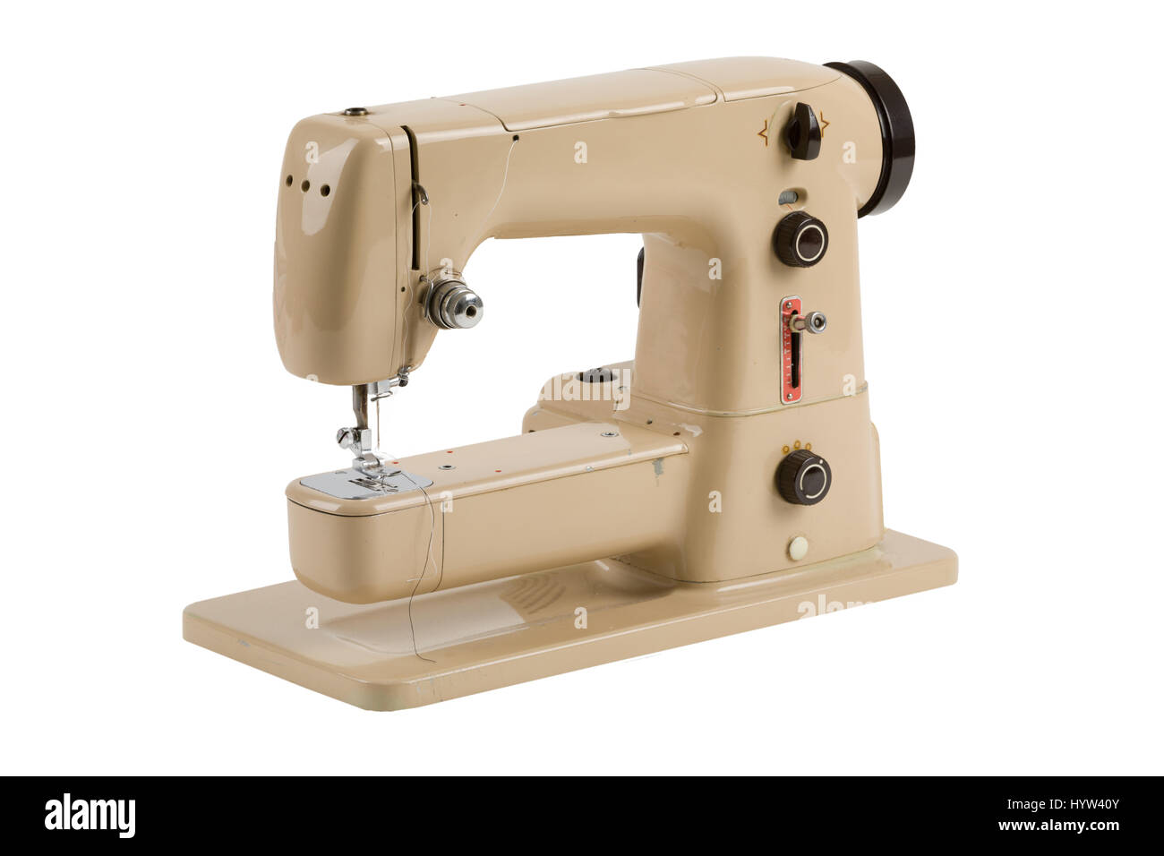 Old vintage sewing machine isolated on white background Stock Photo - Alamy
