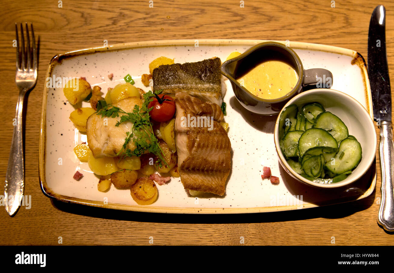 Pannfisch served in Hamburg, Germany. The dish is a traditional North German dish. Stock Photo