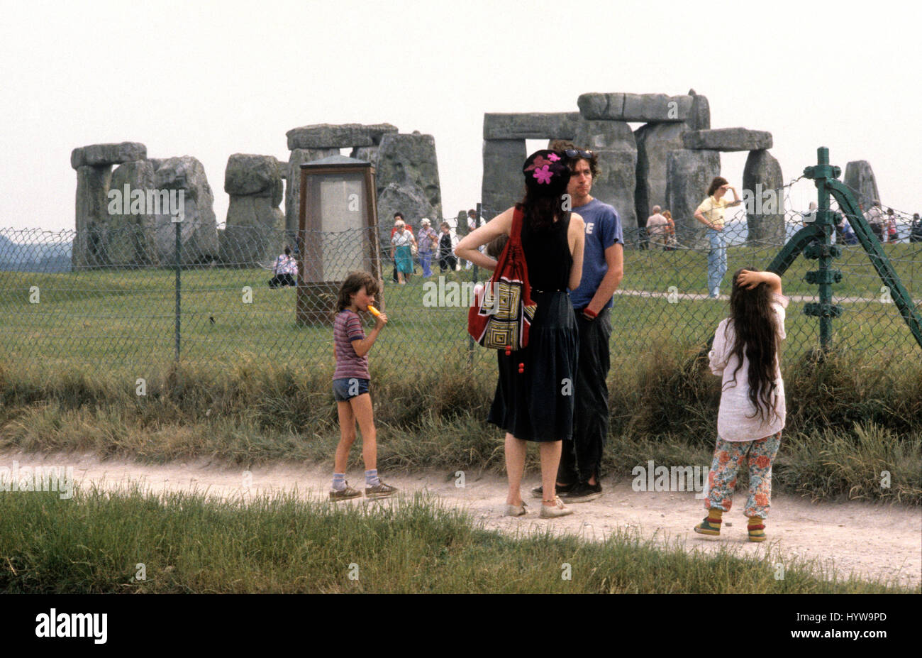 Hippy family outside Stonehenge in June 1986 Stock Photo