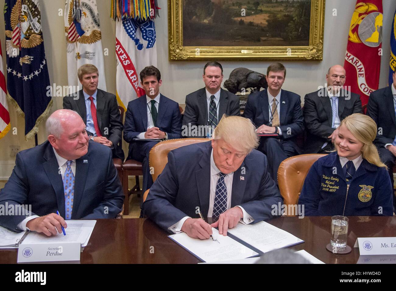 President Signs Politician signing document hi-res stock photography and images - Alamy
