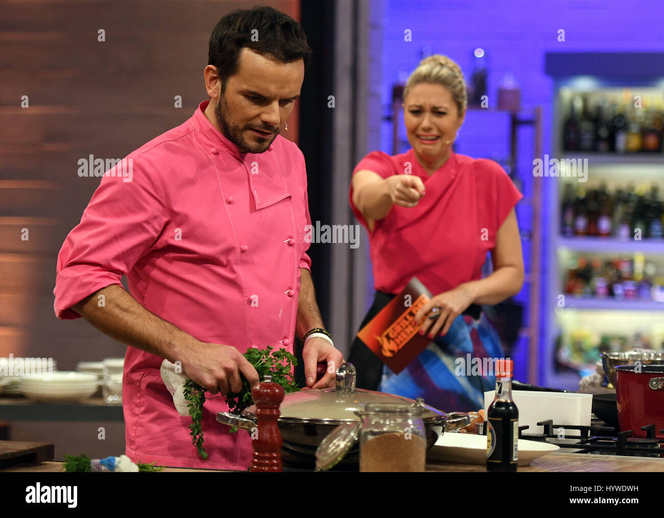 Chef Steffen Henssler and host Ruth Moschner (r), photographed during the  shooting of the VOX TV cooking show 'Grill den Henssler' in Cologne,  Germany, 26 March 2017. The show will run on