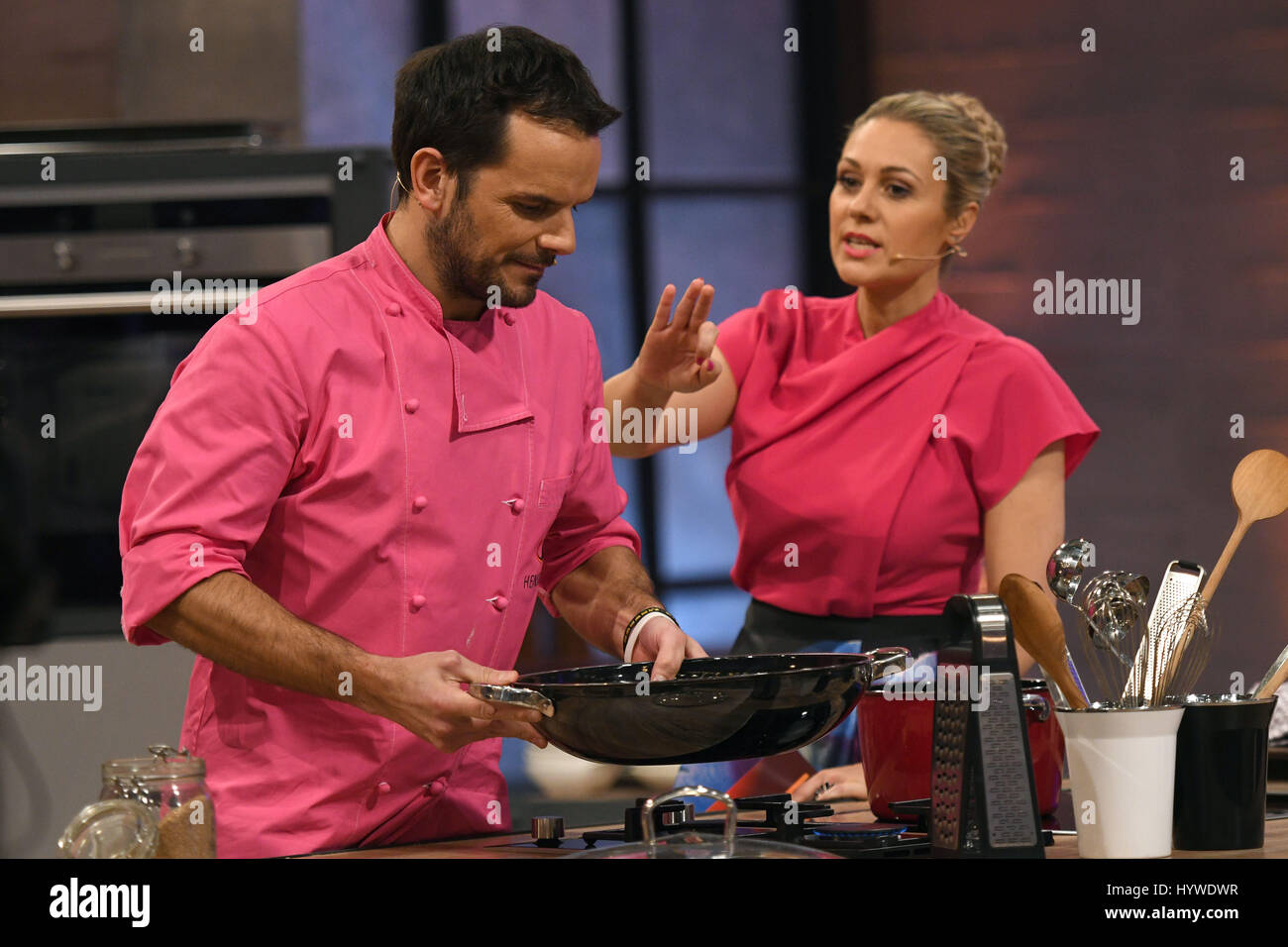 Chef Steffen Henssler and host Ruth Moschner (r), photographed during the  shooting of the VOX TV cooking show 'Grill den Henssler' in Cologne,  Germany, 26 March 2017. The show will run on