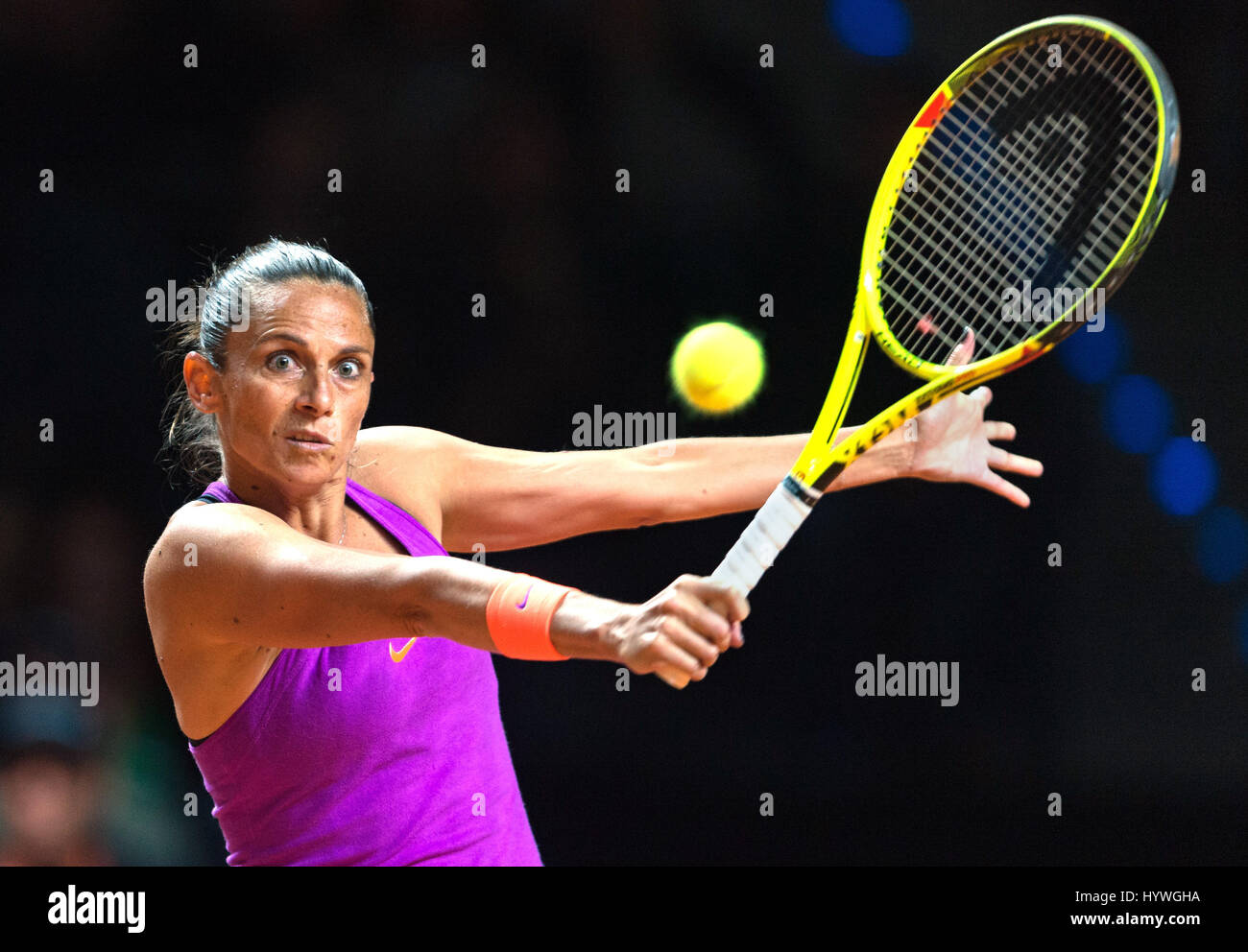 Stuttgart, Germany. 26th Apr, 2017.  Roberta Vinci from Italy does a backhand strike against Russia's Sharapova during their first round tennis match at the Porsche Tennis Grand Prix in Stuttgart, Germany, 26 April 2017. Credit: dpa picture alliance/Alamy Live News Stock Photo