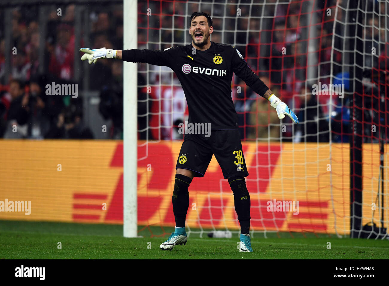 Munich, Germany. 26th Apr, 2017.      Dortmund goalkeeper Roman Burki giving directions during the DFB German Cup semi-final soccer match between Bayern Munich and Borussia Dortmund in the Allianz Arena in Munich, Germany, 26 April 2017. ATTENTION: BLOCKING PERIOD! The DFB permits the further utilisation and publication of the pictures for mobile services (especially MMS) and for DVB-H and DMB only after the end of the match. Stock Photo