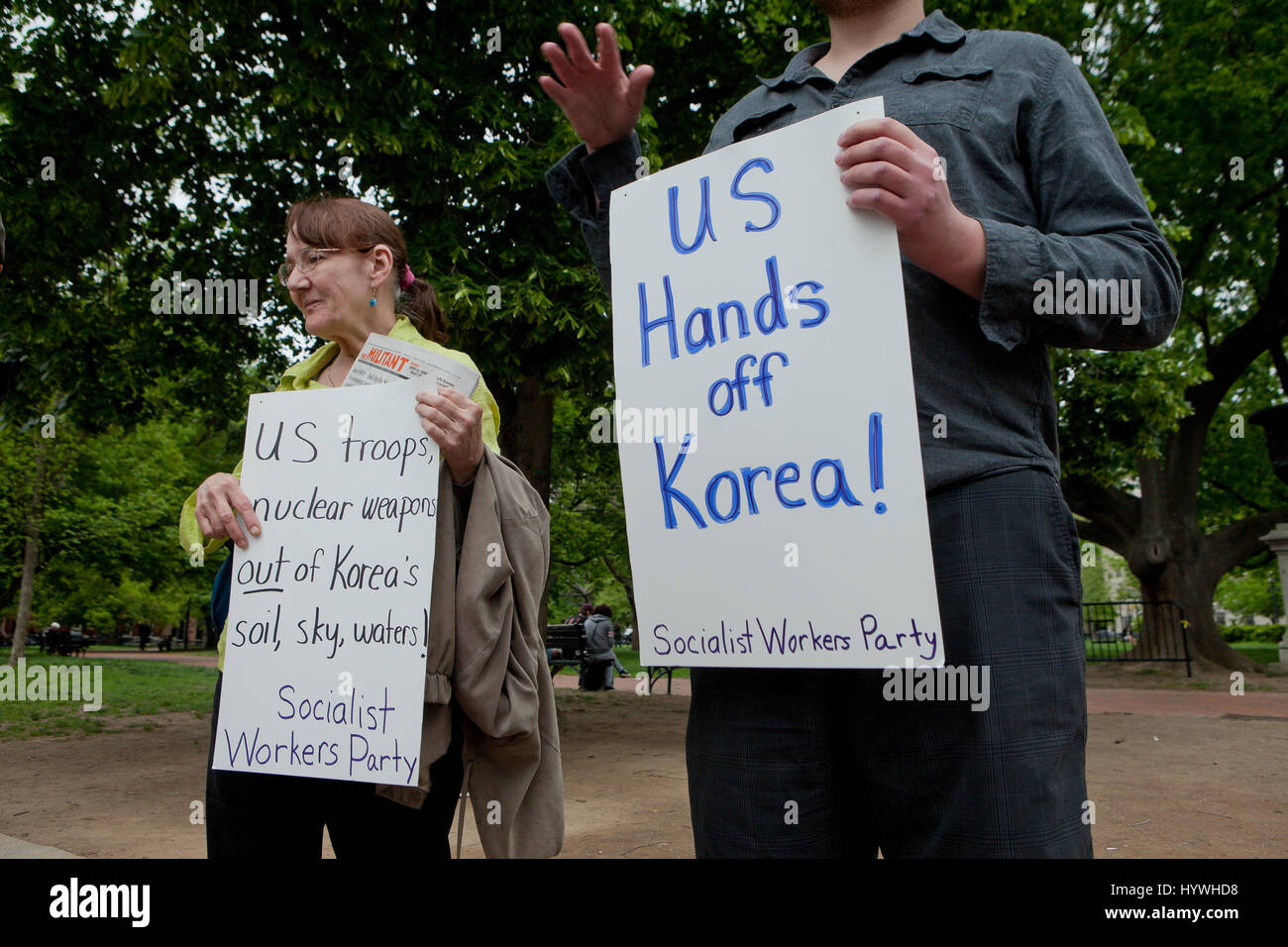 Washington, DC, USA. 26th April, 2017. As tensions continue to rise between US and North Korea, members of the Socialist Workers Party protest against US involvement in the Korean peninsula in front of the White House. Credit: B Christopher/Alamy Live News Stock Photo