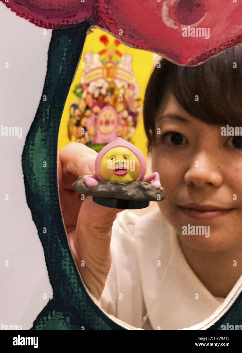 Tokyo, Japan. 26th Apr, 2017. Akiko Mutsunaga holds a Kobitos Dukan  character, Kobitos which now is been air on Malaysia and China TV is on  display during the Licensing Expo 2017 at