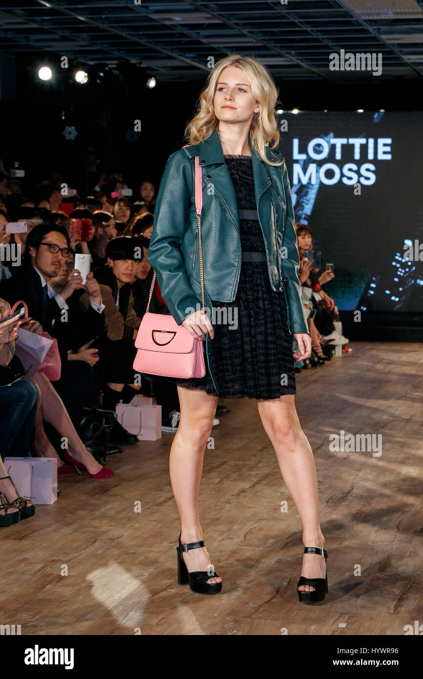 Lottie Moss holding up a Samantha Thavasa bag walks down the runway during the Samantha Millennial Stars promotional event on April 27, 2017, Tokyo, Japan. The Japanese fashion and accessories brand is launching a new television commercial directed by Terry Richardson that features the five millennial models. Credit: Rodrigo Reyes Marin/AFLO/Alamy Live News Stock Photo
