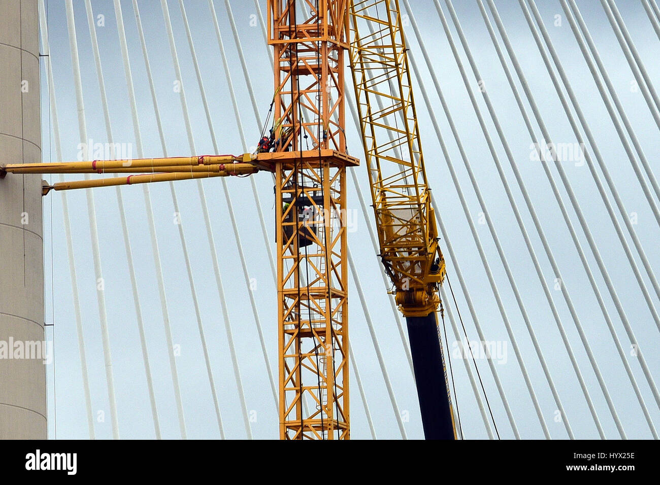 Edinburgh, Scotland, United Kingdom. 7th April, 2017. Intermittent progress continues on dismantling the construction cranes on the Queensferry Crossing which spans the Forth Estuary near Edinburgh. High winds through the winter have disrupted progress on the work, which has been a factor in the delay in the planned opening of the bridge until August 2017. Credit: Ken Jack/Alamy Live News Stock Photo