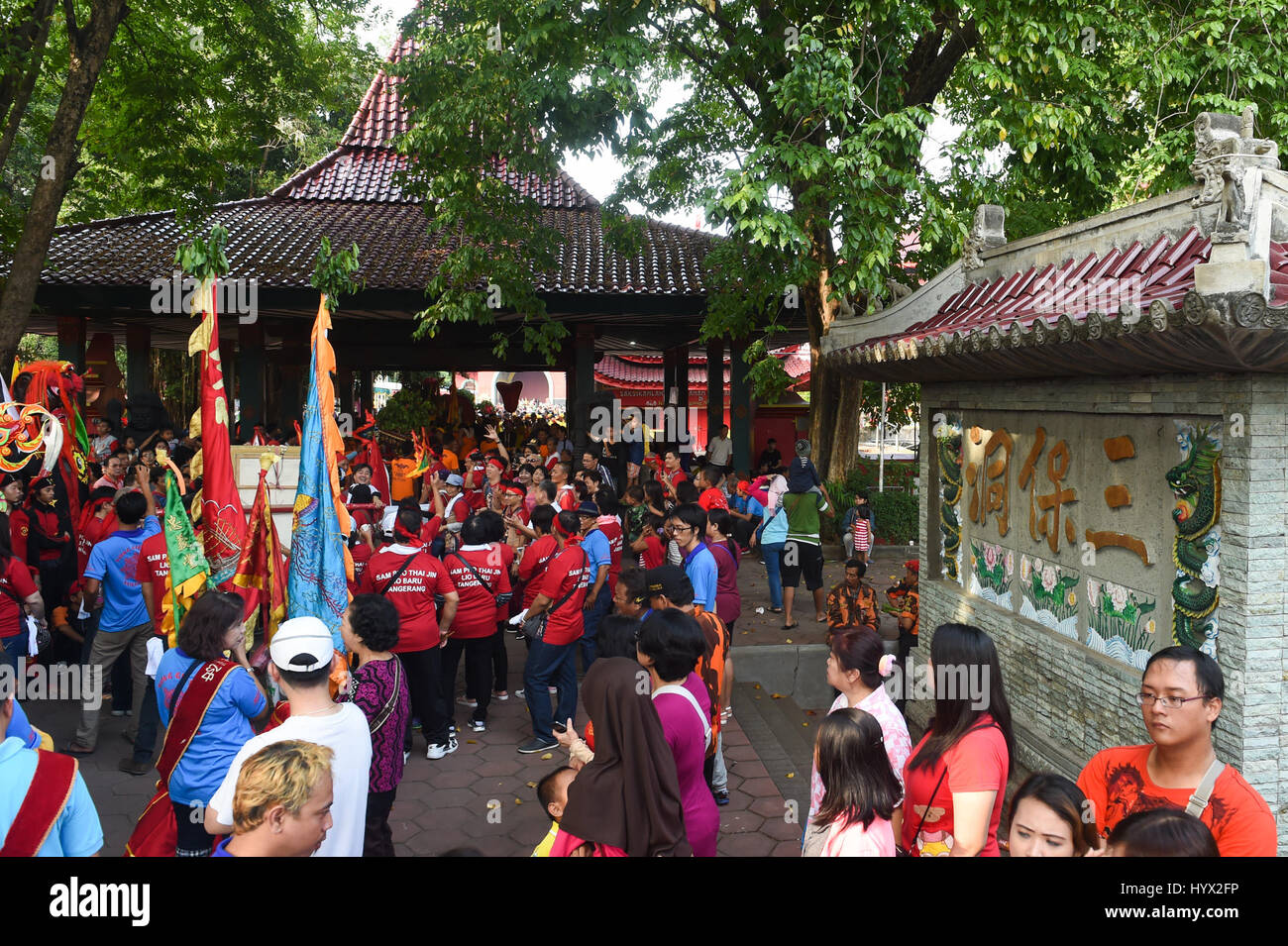 (170407) -- SEMARANG(INDONESIA), April 7, 2017 (Xinhua) -- Photo taken on July 31, 2016 shows a ceremony to commemorate the Chinese Ming Dynasty (1368-1644) navigator Zheng He's arrival at Semarang at the Sam Poo Kong Temple in Semarang, Indonesia. Chinese navy explorer Zheng He who visited the Central Java Province's port city of Semarang 600 years ago has an enduring legacy in the capital of the province. Arriving here at the beginning of the 15th century, Zheng He made a cave on the Simongan Hill as his temporary abode and repaired his ships. During his stay, Zheng He built a mosque and set Stock Photo