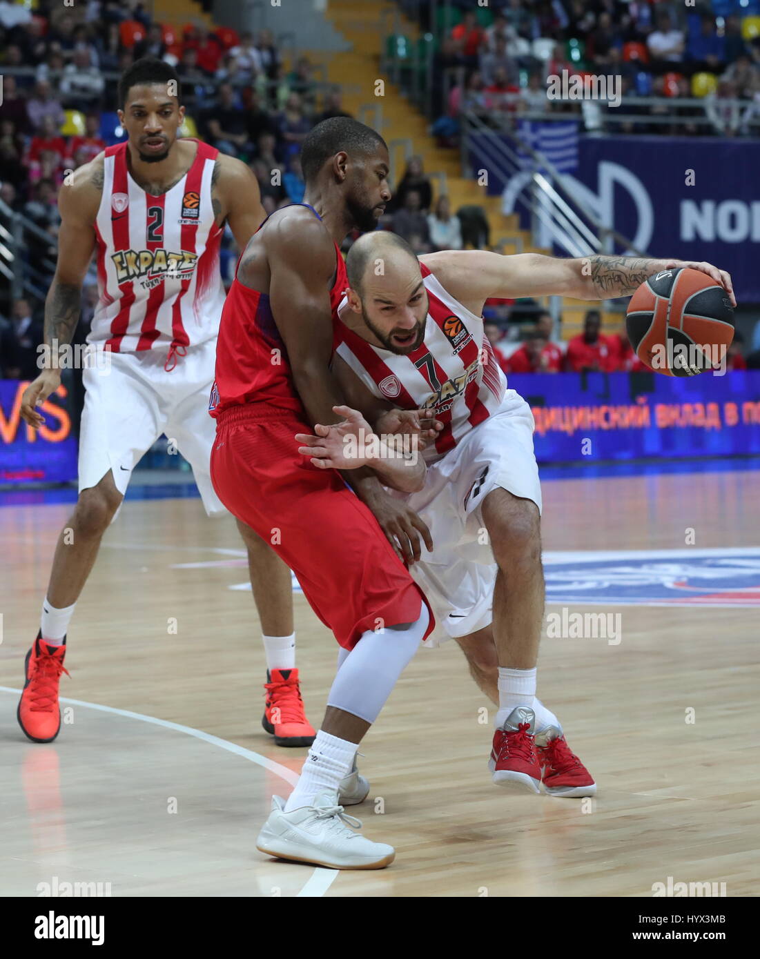 Moscow, Russia. 7th Apr, 2017. CSKA Moscow's Cory Higgins, Olympiacos  Piraeus' Vassilis Spanoulis (L-R front) and Olympiacos Piraeus' Khem Birch  (background) in action in their 2016-17 Euroleague Regular Season Round 30  basketball
