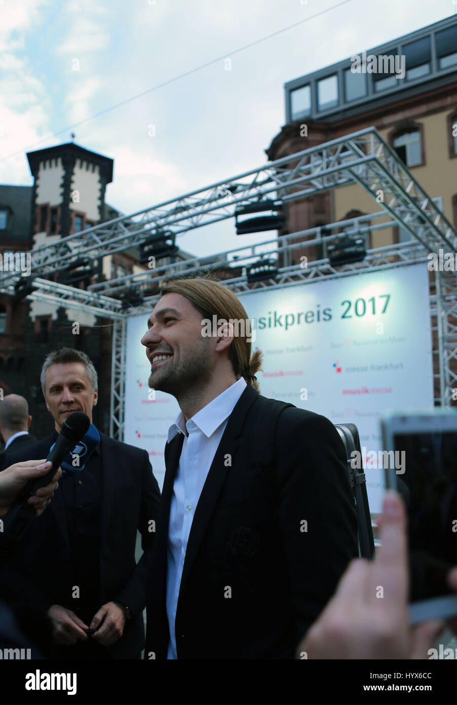 Frankfurt. 7th Apr, 2017. Violinist David Garrett speaks to the media during the awarding ceremony of the Frankfurt Music Prize 2017 at the St Paul's Church in Frankfurt, Germany on April 7, 2017. David Garrett was honored with the Frankfurt Music Prize 2017 on Friday. Credit: Luo Huanhuan/Xinhua/Alamy Live News Stock Photo