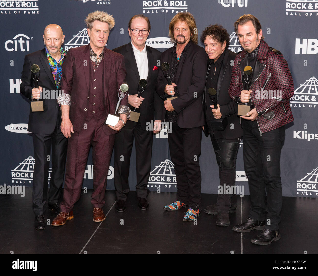 Brooklyn, New York, USA. 7th Apr, 2017. STEVE SMITH, ROSS VALORY, AYNSLEY DUNBAR, GREGG ROLLIE, NEAL SCHON and JONATHAN CAIN of Journey walk the red carpet at Barclay's Center during the Hall of Fame Induction ceremony in Brooklyn, New York Credit: Daniel DeSlover/ZUMA Wire/Alamy Live News Stock Photo