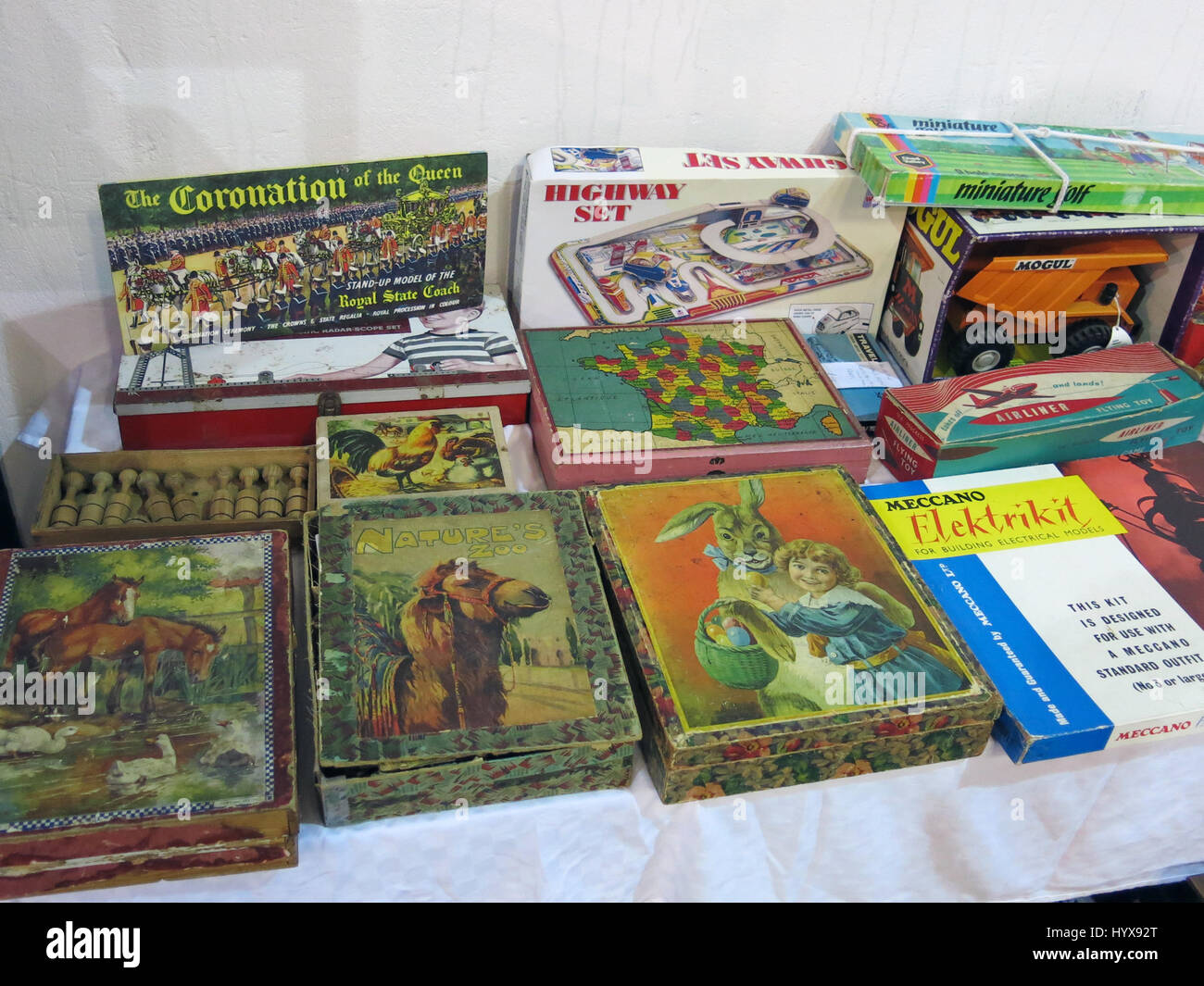 A selection of rare and collectable board games and jigsaws for sale at a Vintage Toy Fair at Bath & West Showground, Somerset, England Stock Photo