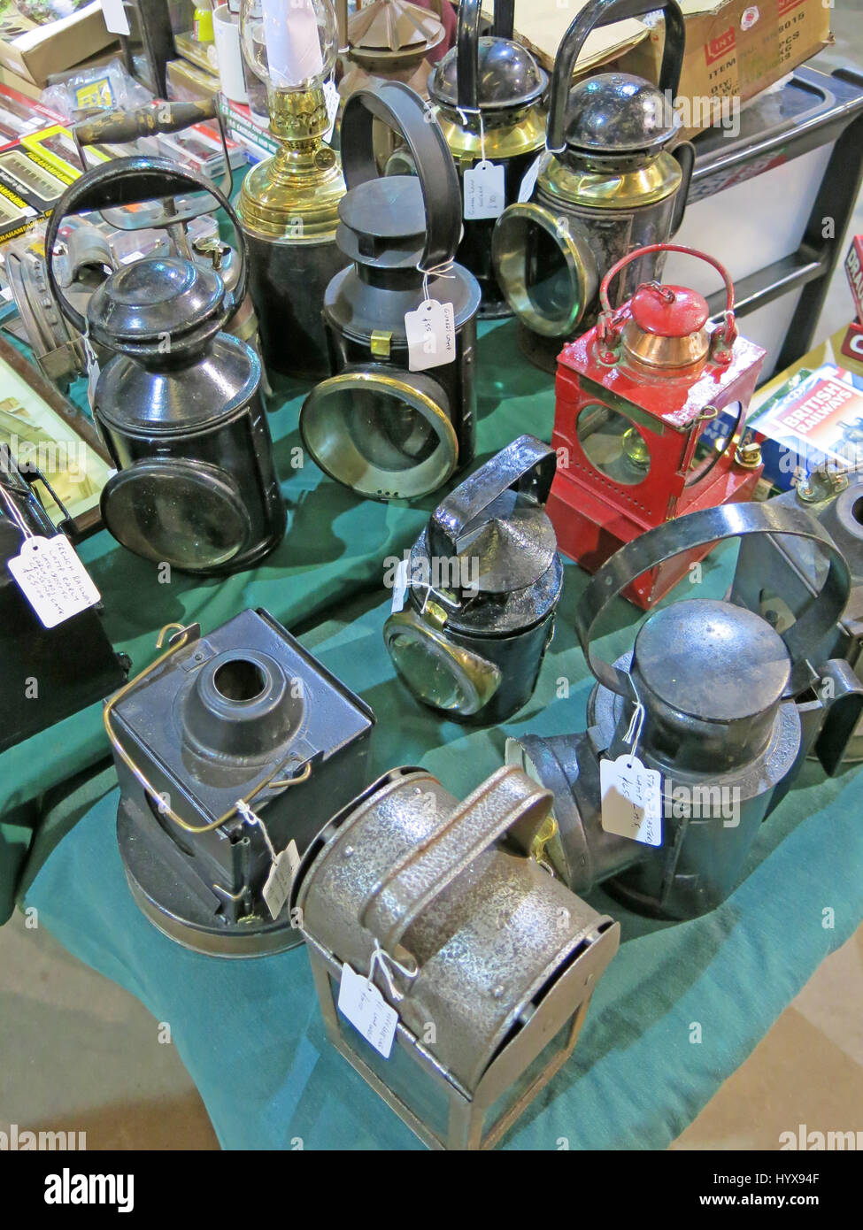 A selection of rare and collectable historic railway hand lamps for sale at a Vintage Toy Fair at the Bath & West Showground, Somerset, England Stock Photo