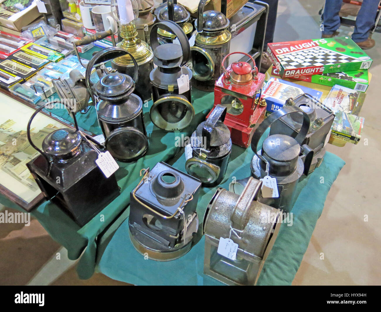 A selection of rare and collectable historic railway hand lamps for sale at a Vintage Toy Fair at the Bath & West Showground, Somerset, England Stock Photo