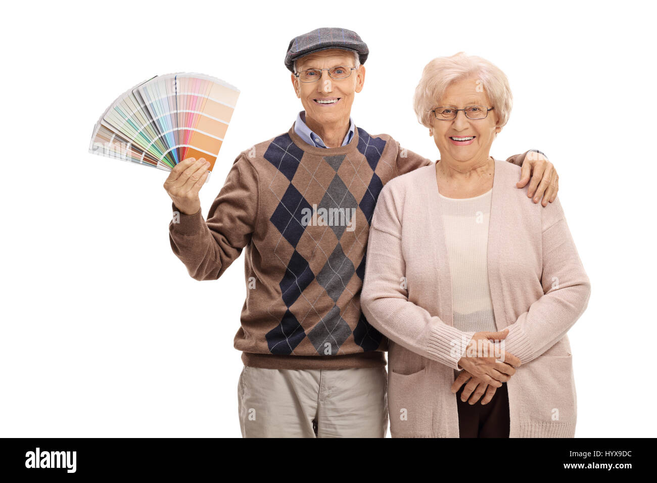 Elderly couple with a color swatch isolated on white background Stock Photo