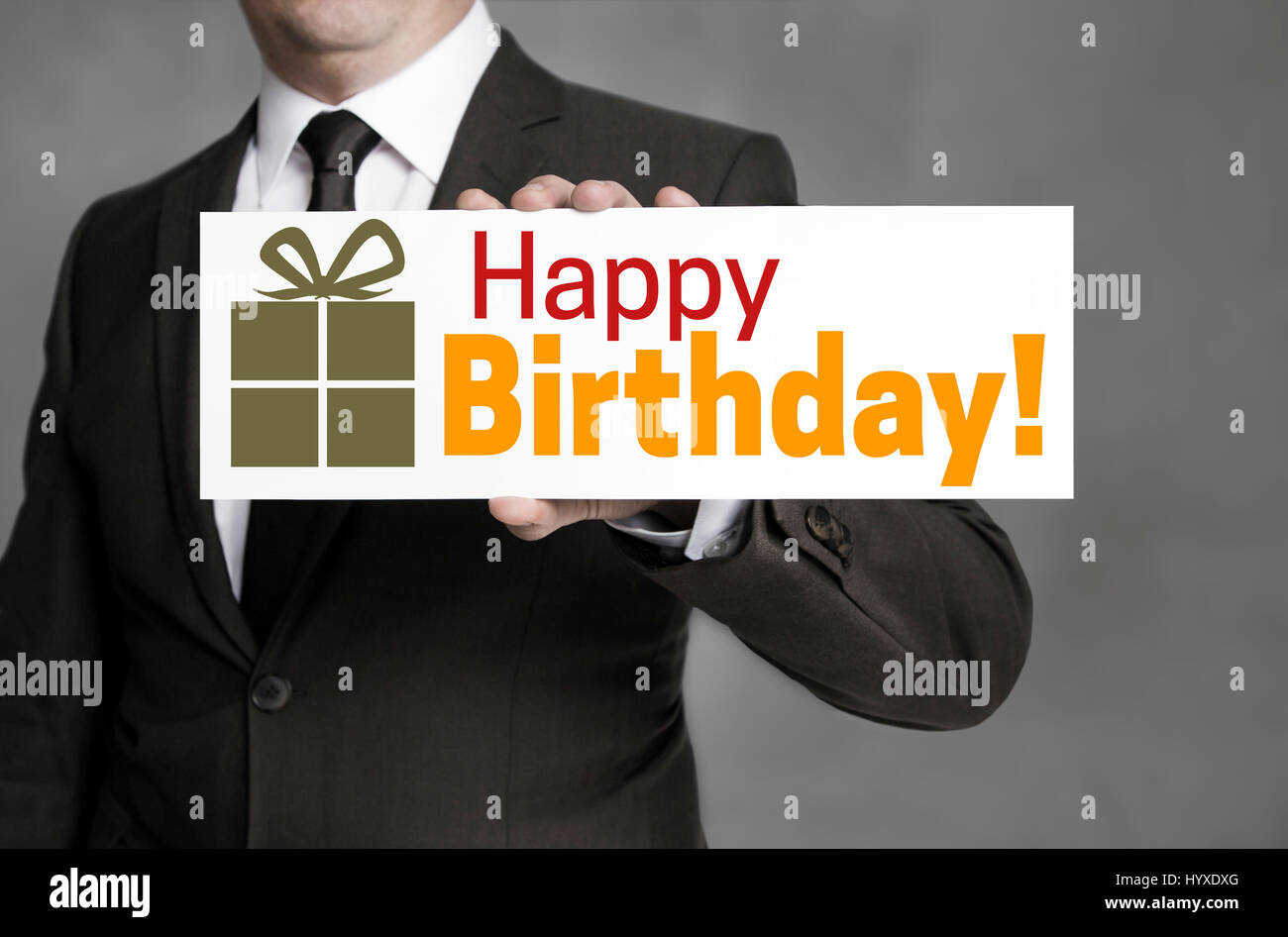 Happy Birthday Shield Is Held By Businessman Stock Photo Alamy
