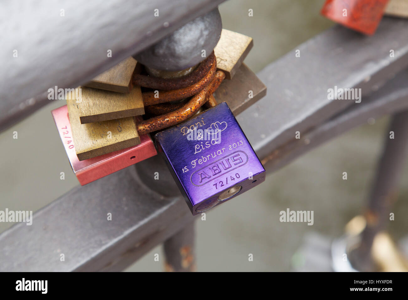 Love locks on a bridge in Hamburg, Germany. The lock was placed on the bridge in 2013 Stock