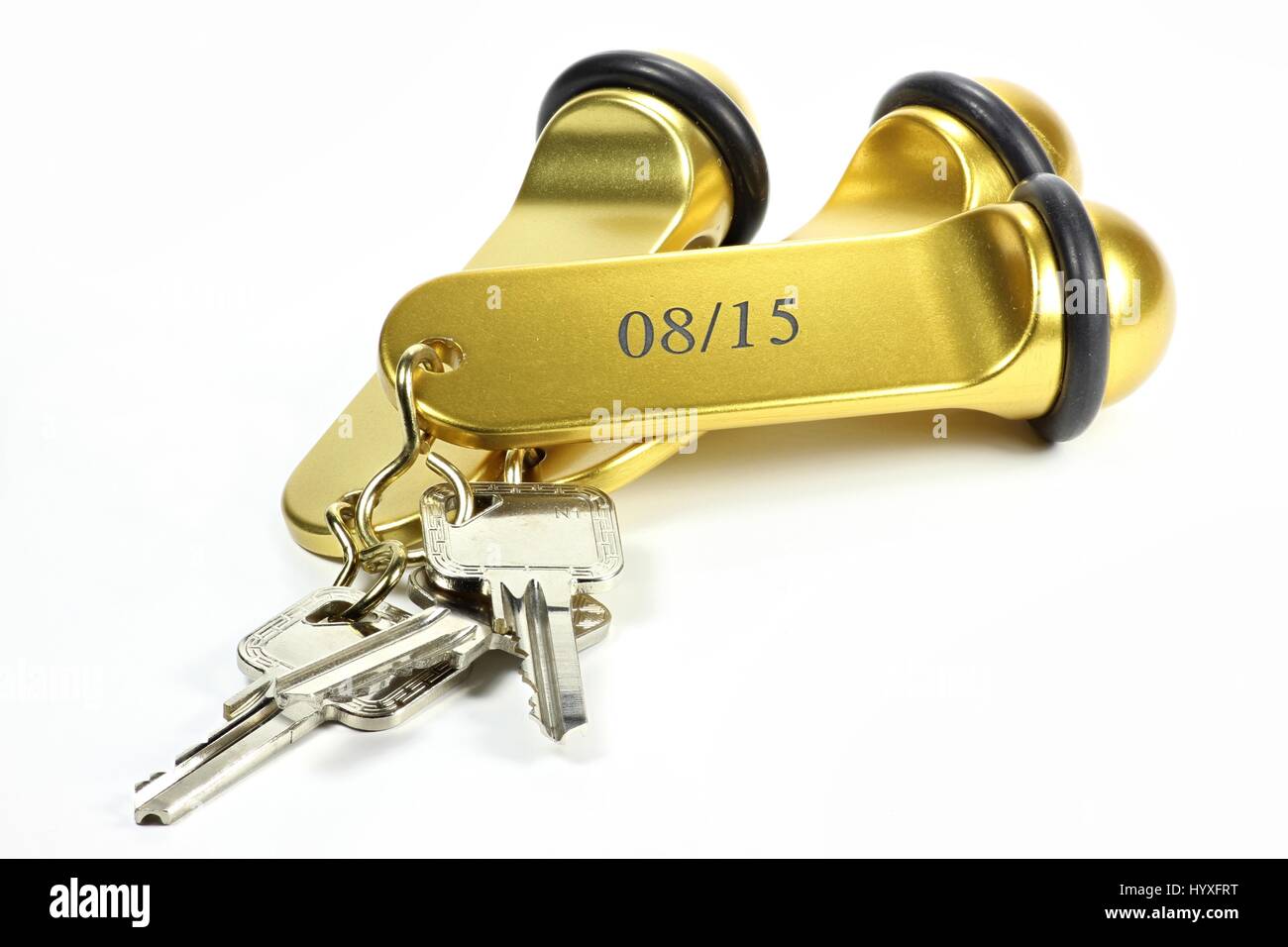 08/15 hotel key isolated on white background. 08/15 is a (German) phrase and means ordinary/ unspectacular. Stock Photo