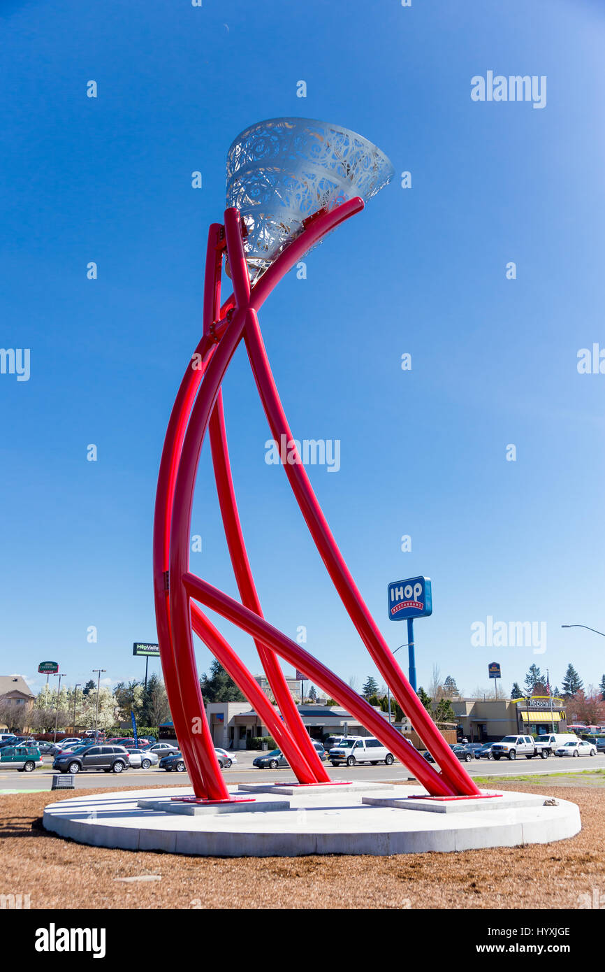 SPRINGFIELD, OR - MARCH 31, 2017: This steel art sculpture is known as the Springfield Flame and is statue made entirely out of metal. Stock Photo