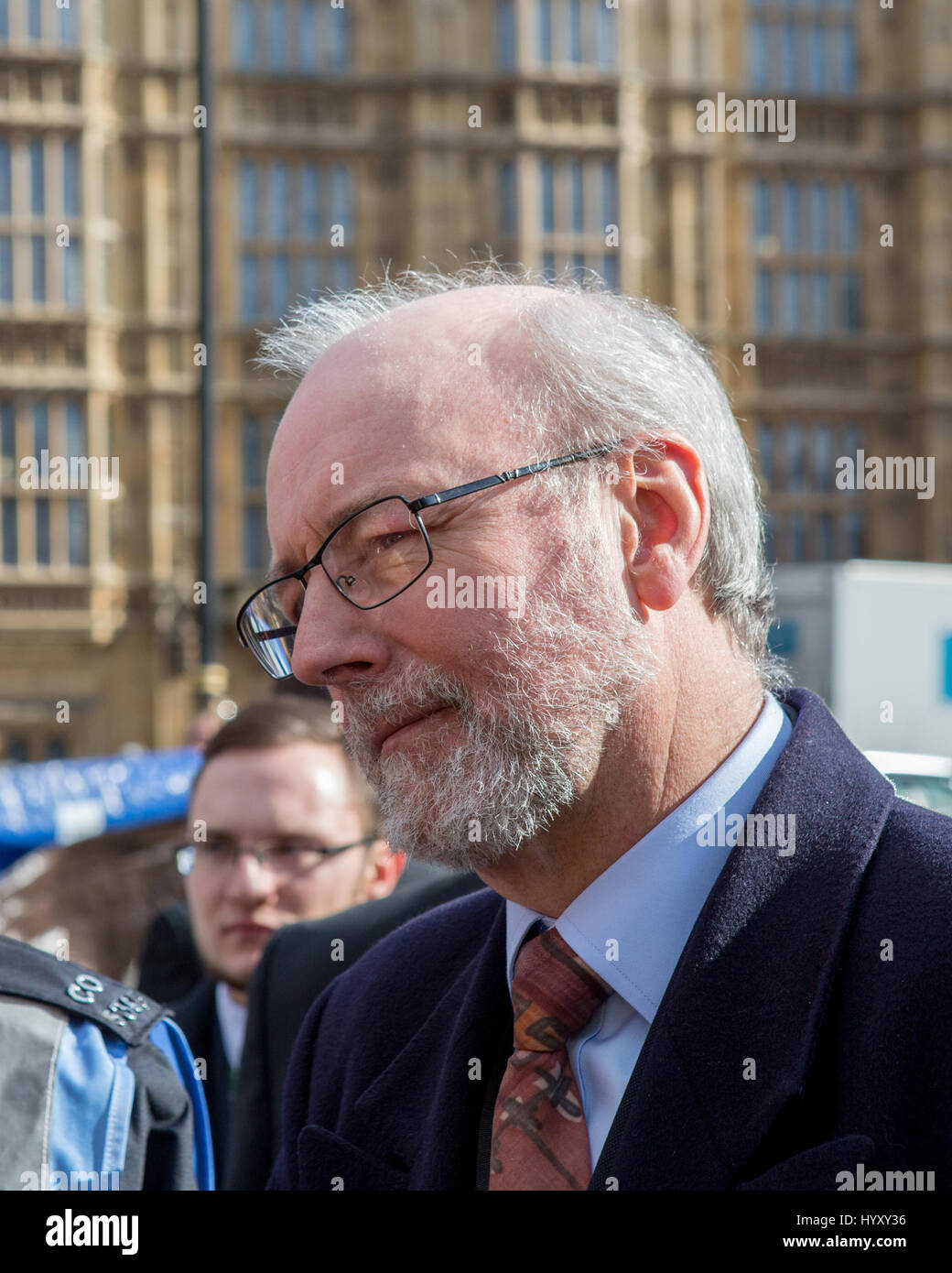 Disabled people protest cuts to benefits outside Parliament, London, UK