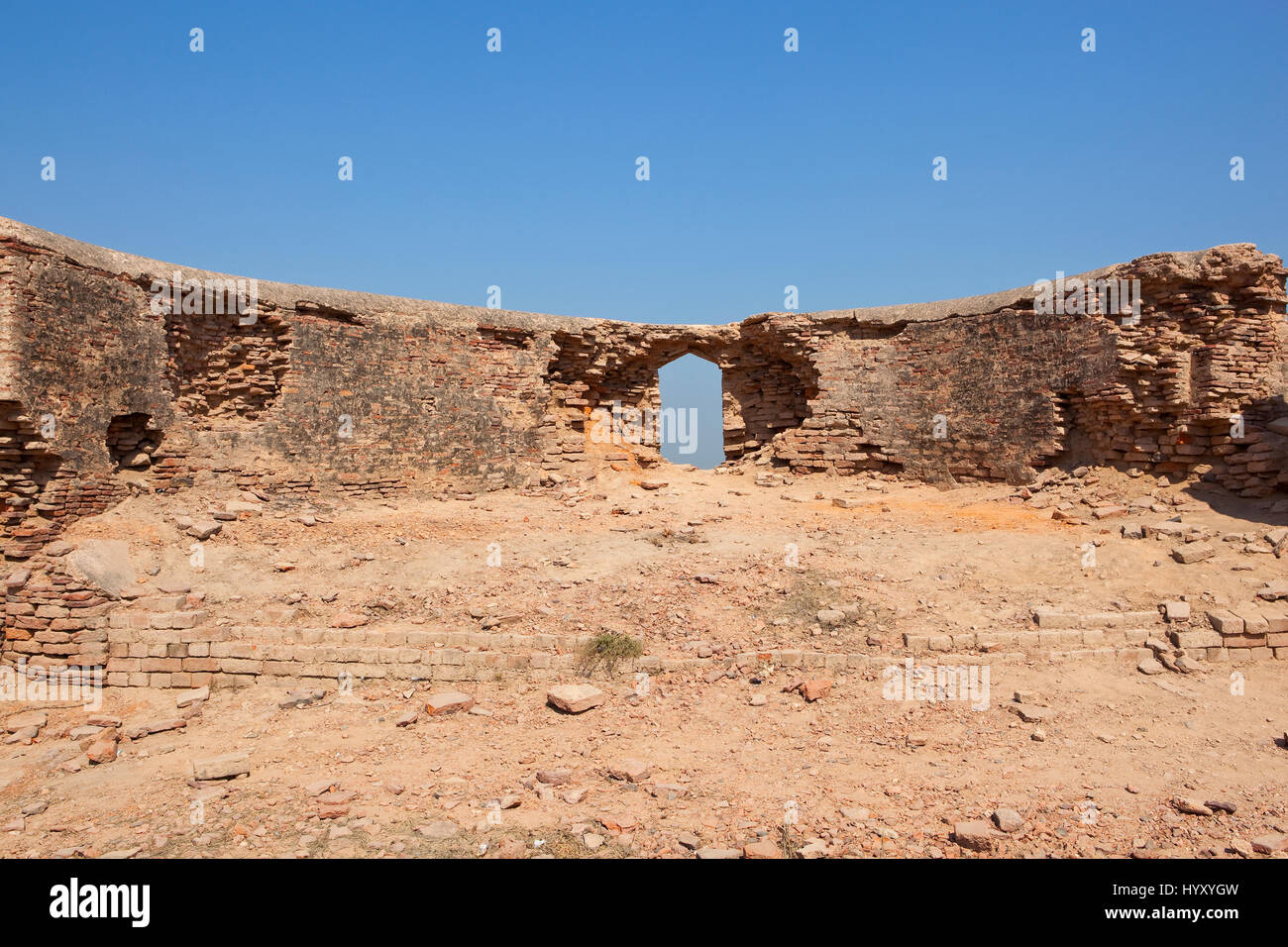 crumbling walls currently being restored at bhatner fort in the city of hanumangarh rajasthan india under a clear blue sky Stock Photo