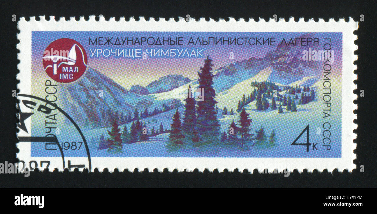 USSR - CIRCA 1987: A post stamp printed in USSR shows image of mountains Chimbulak in USSR, circa 1987 Stock Photo
