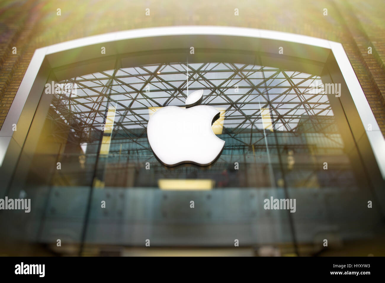 Font of Apple store, top technology brand globally Beautiful natural light, clear clean logo. Stock Photo