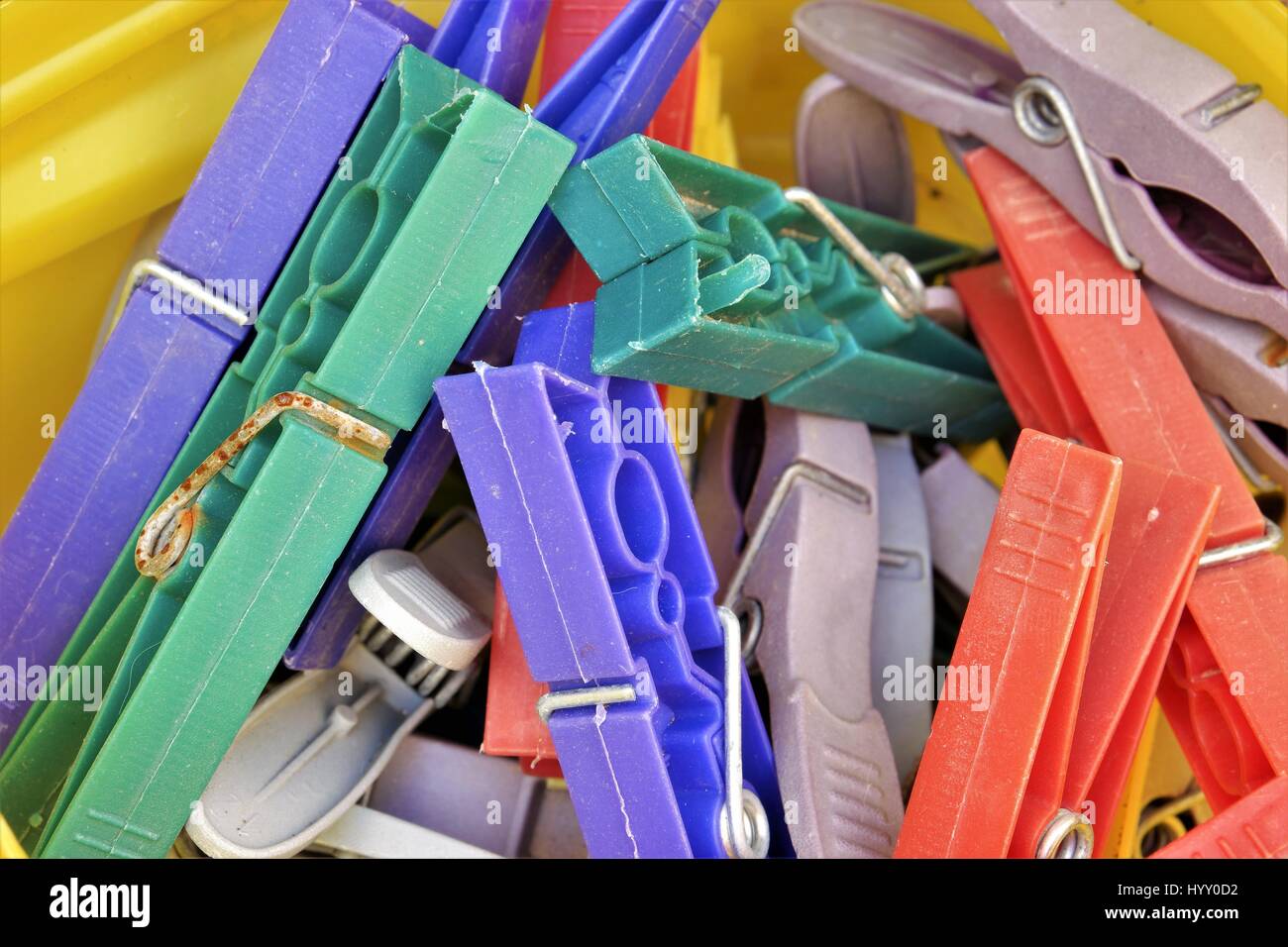 Colorful tweezers to hang clothes to dry Stock Photo