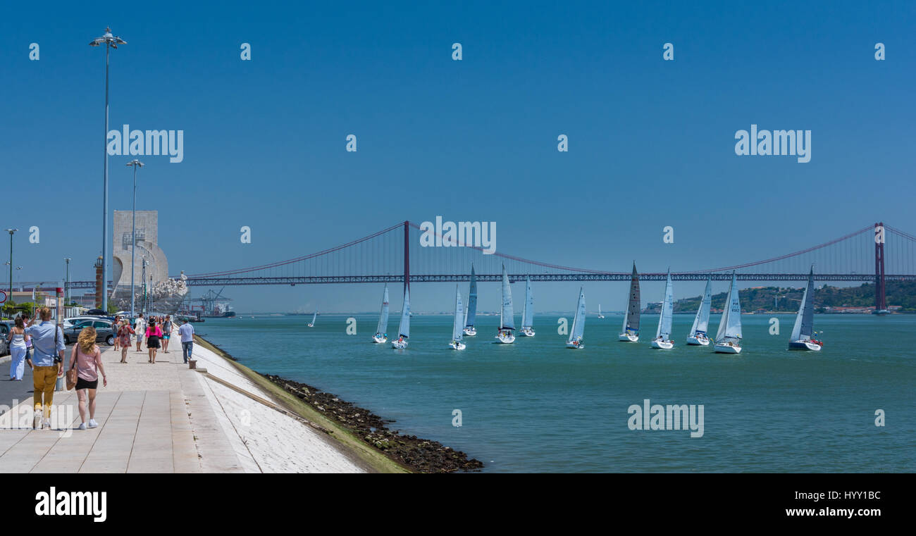 Sailing regatta in the Tajo river with Padrao dos Descobrimentos in background, Lisbon, Portugal, July-09-2016 Stock Photo
